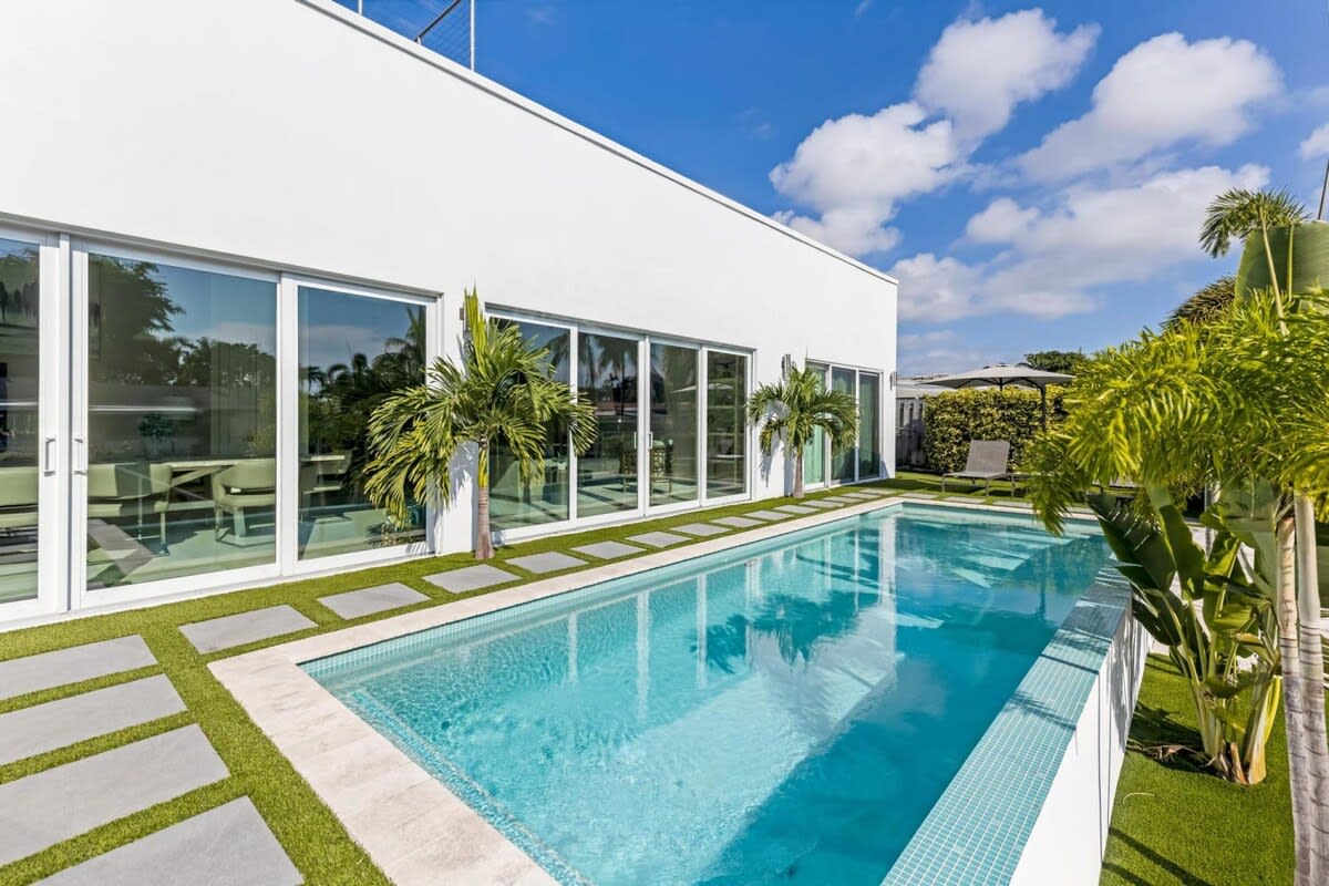 The PEARL Waterfront home w/ heated pool | Frenchy Luxury